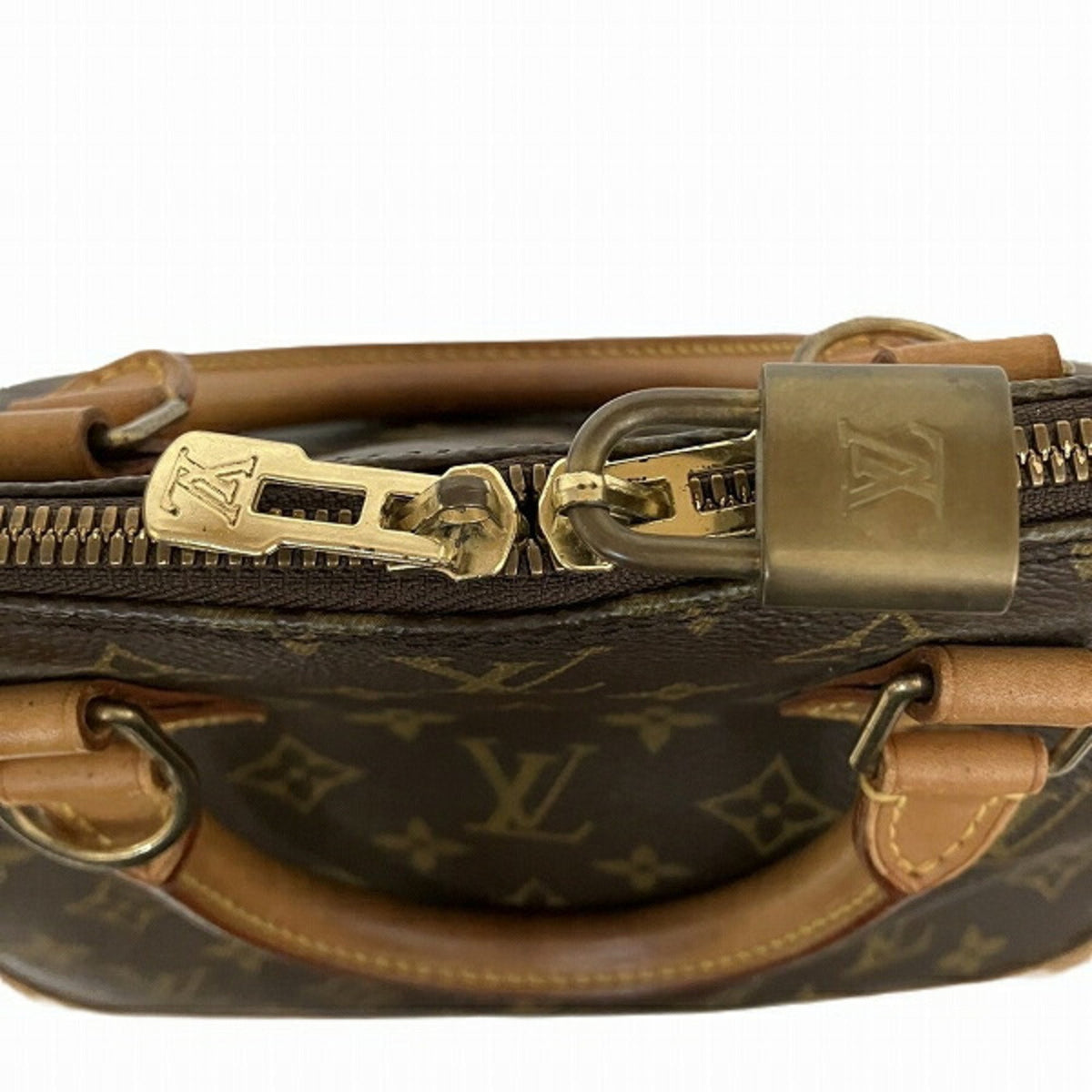 LOUIS VUITTON Alma Handbag
