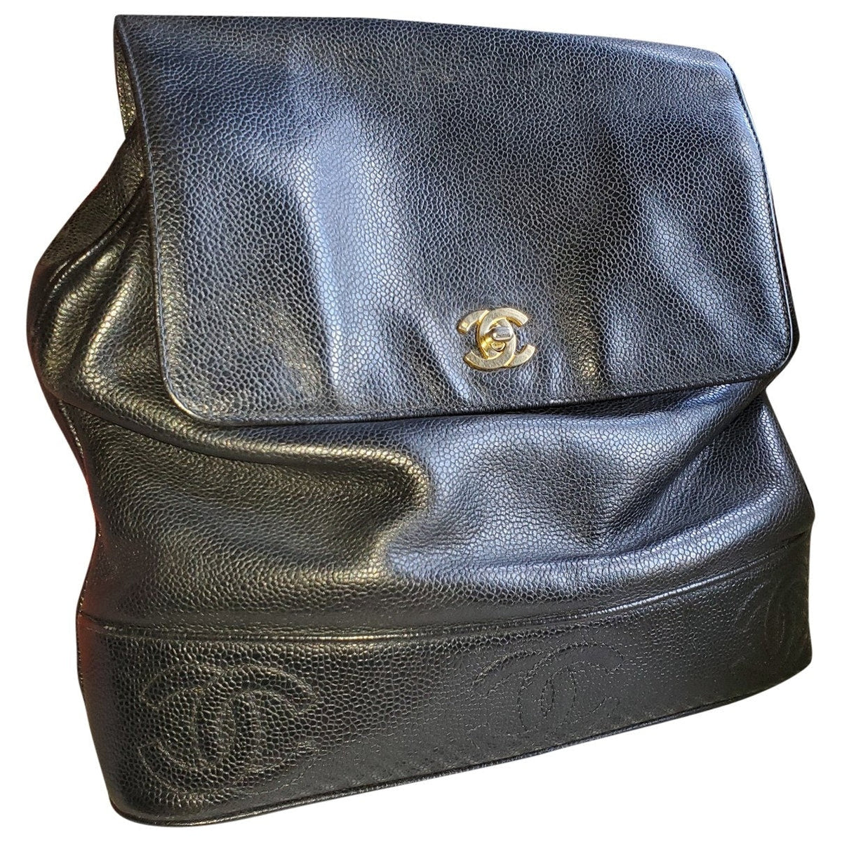 Chanel black leather backpacks