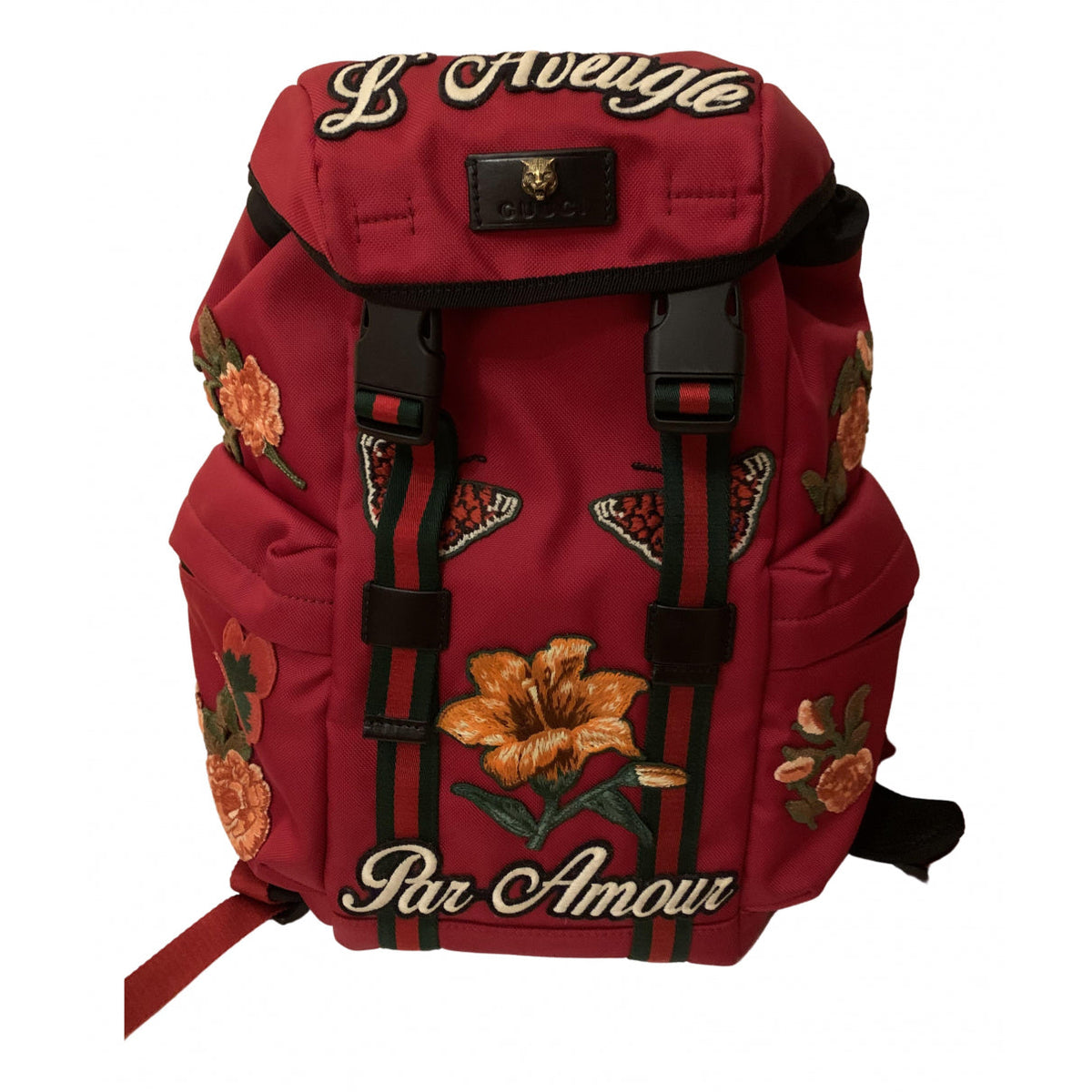Gucci red cloth backpacks