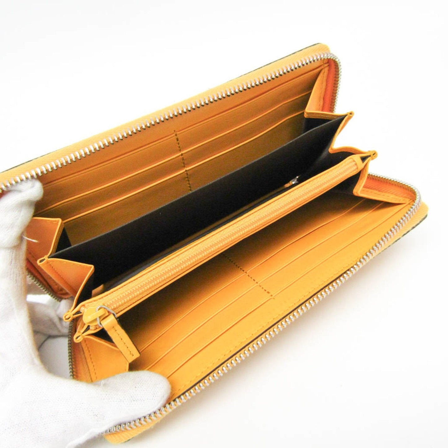 Gucci Gg Embossé Yellow Leather Wallet