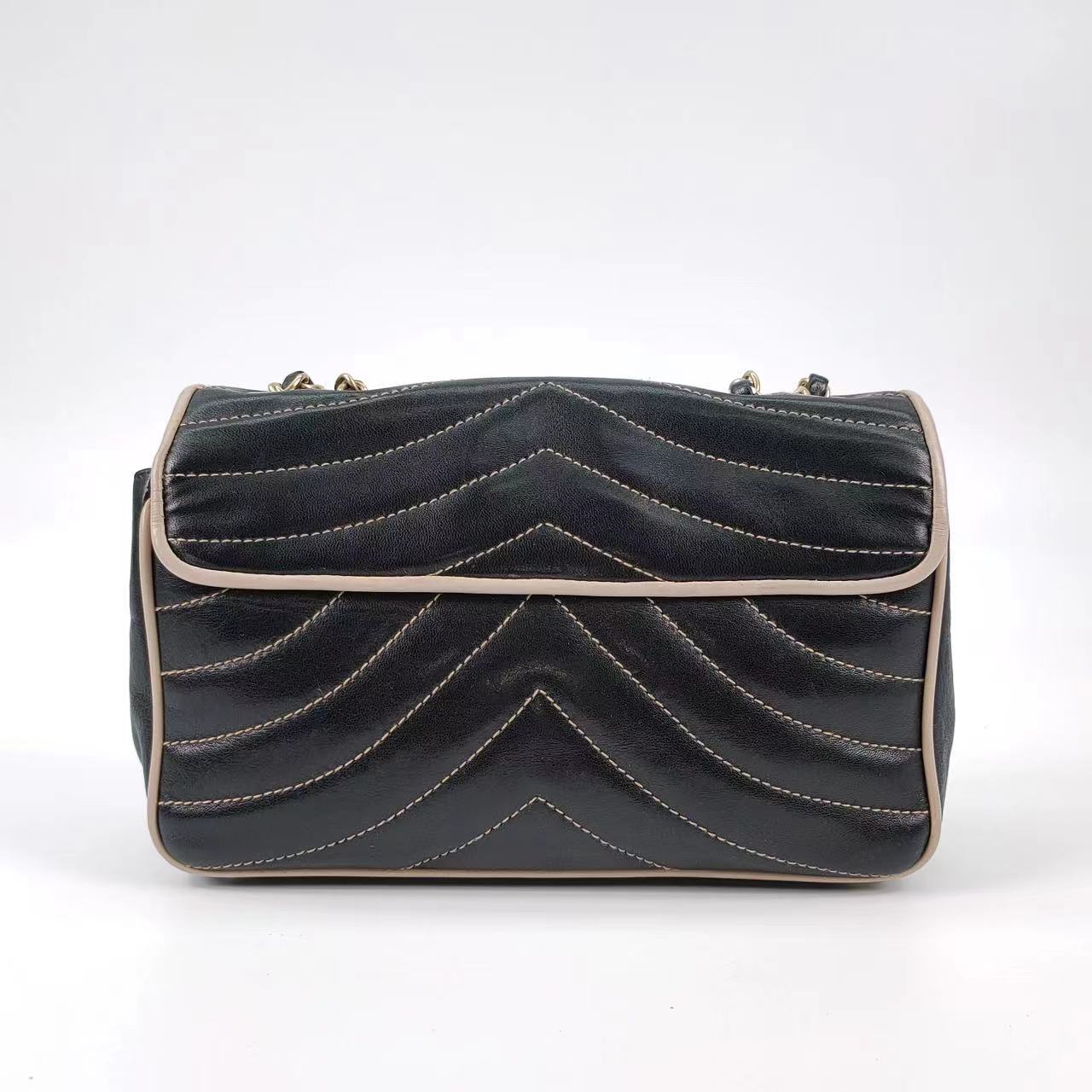 Chanel Chevron Flap Bag in Quilted Lambskin Leather with Gold tone Hardware