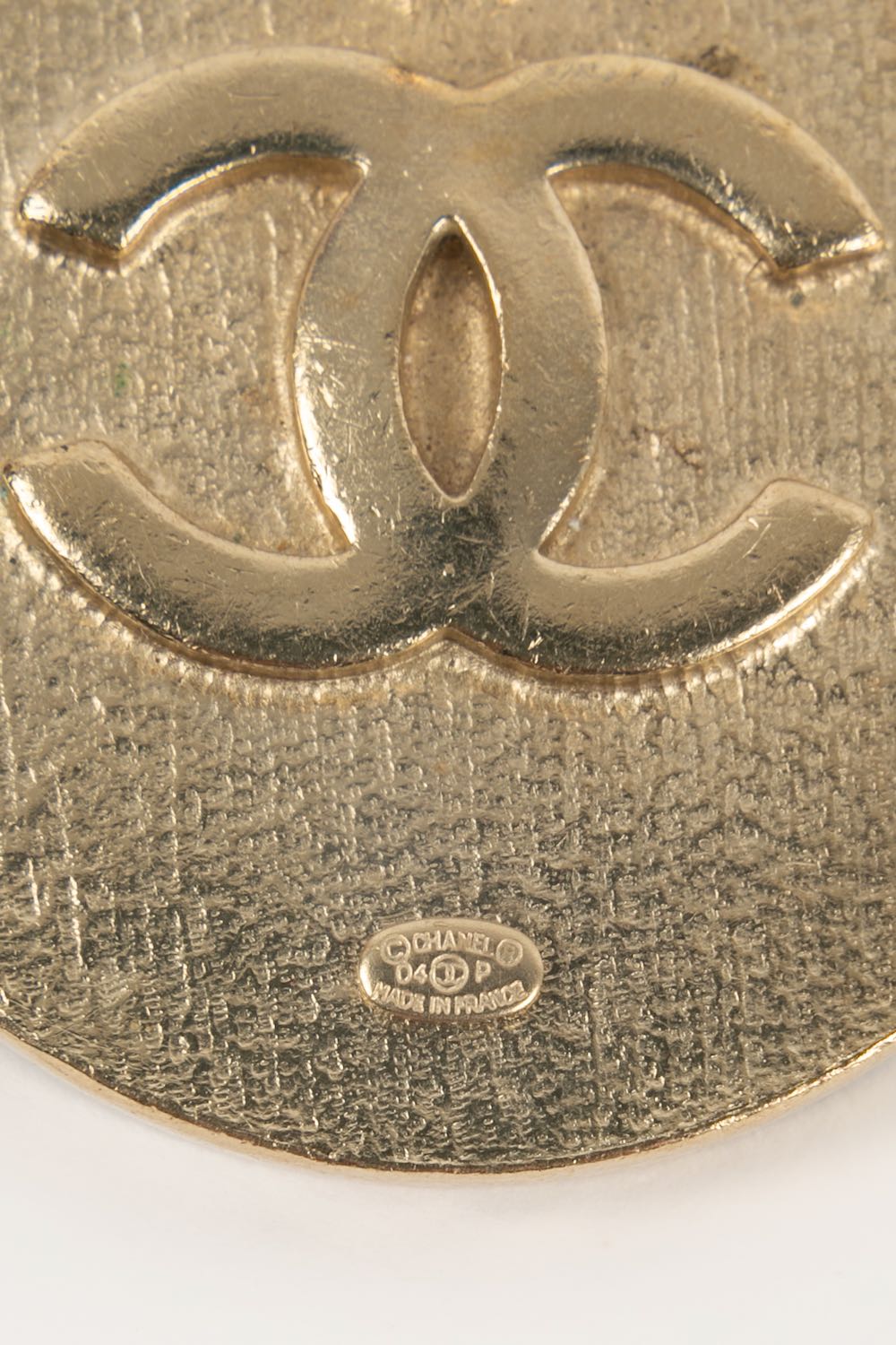 Broche pins Make Up Chanel 2004