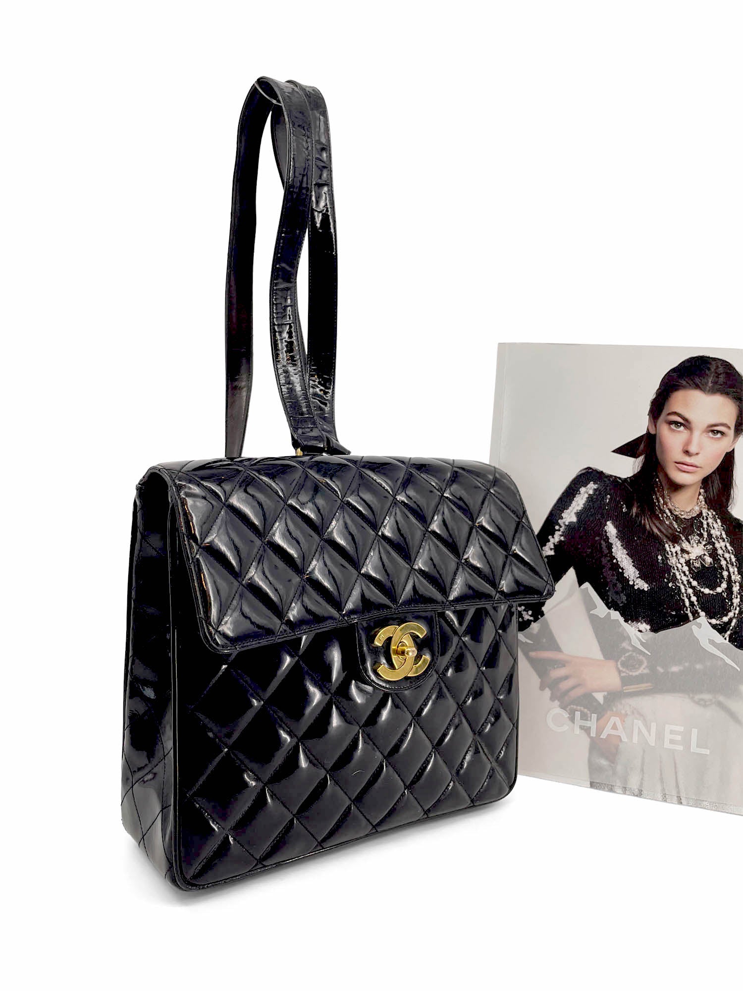 Chanel Vintage k Gold CC Logo Patent Leather Backpack Black – Franco Shops