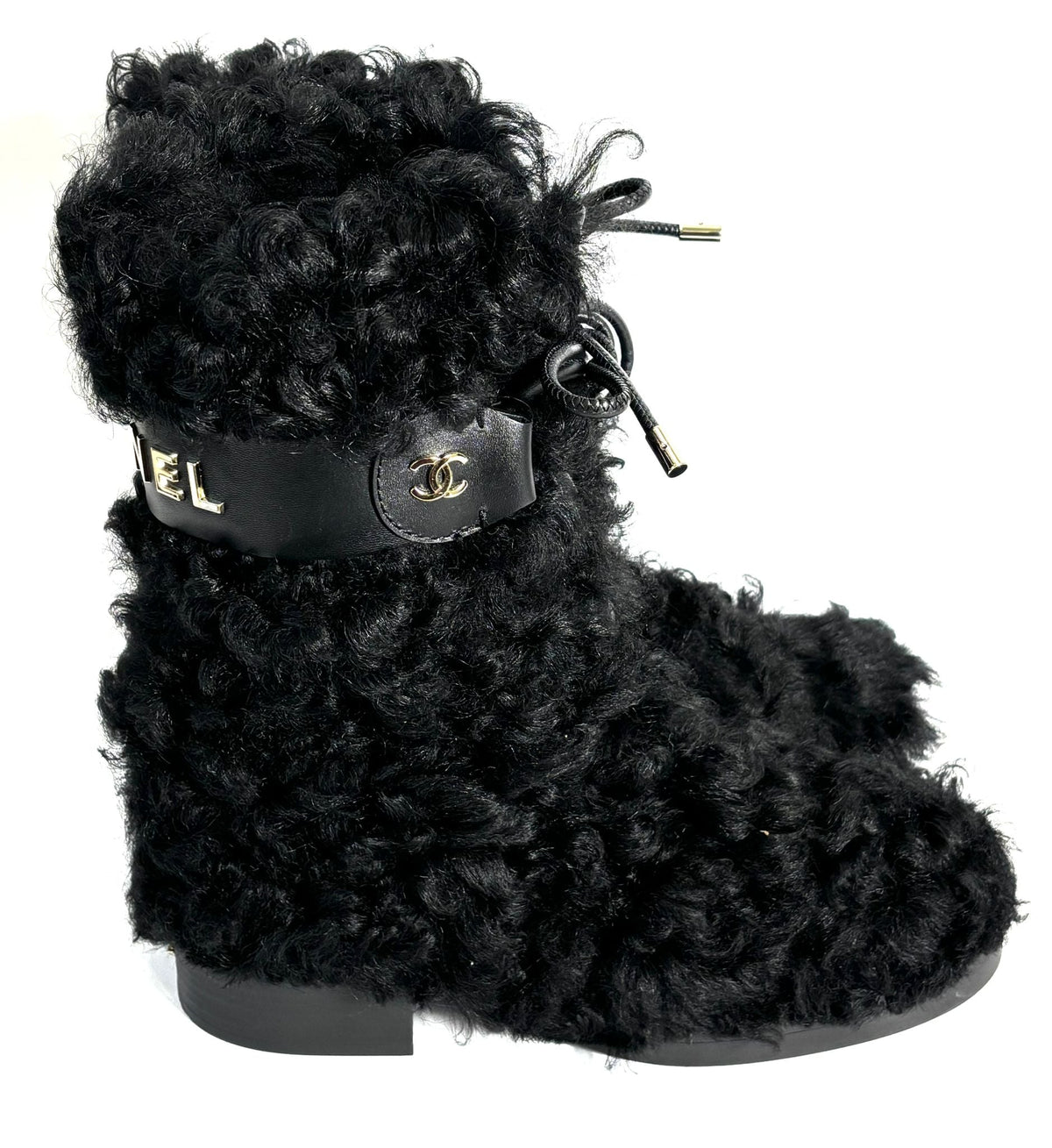 CHANEL INTERLOCKING CC LOGO SHEARLING BOOTS
