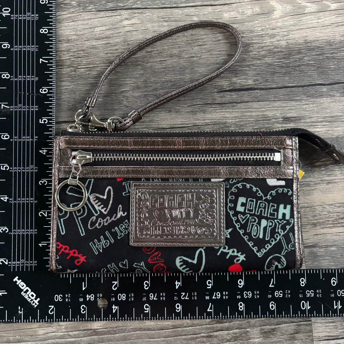 Wristlet Designer By Coach, Size: Large