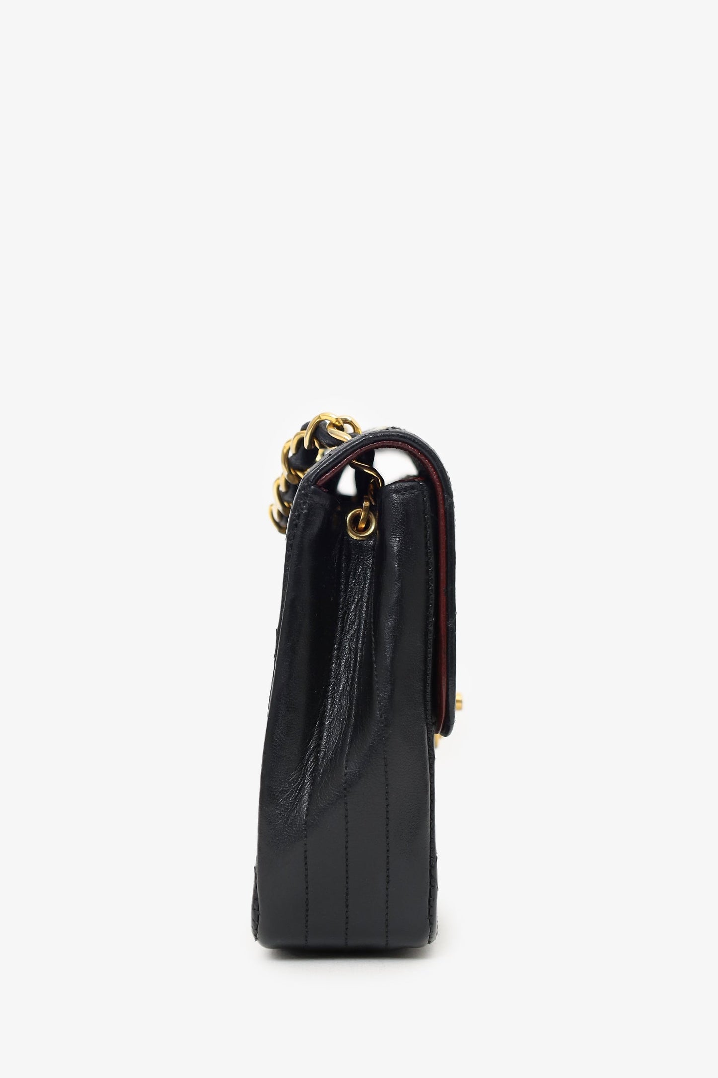 Pre-Loved Chanel™ 1986-88 Black Quilted Lambskin Circle CC Mini Flap Bag