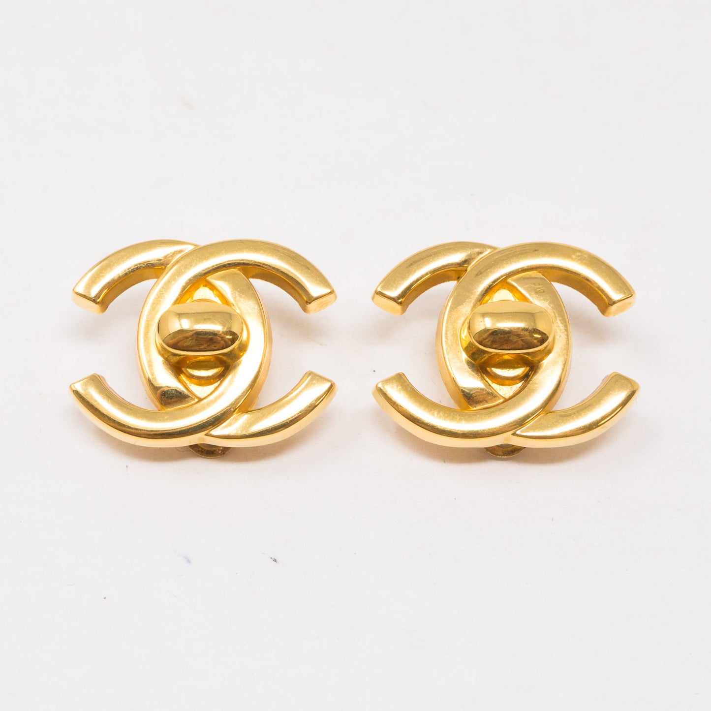 CC Turn Lock Earrings