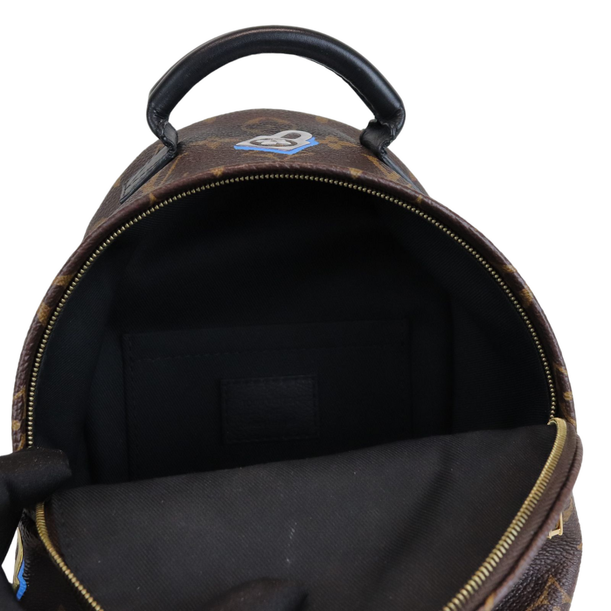 Louis-Vuitton Monogram Love Lock Mini Palm Springs Backpack