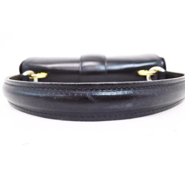 RARE, vintage Gucci, mod, black leather, two-way top handle style purse with gold tone accents
