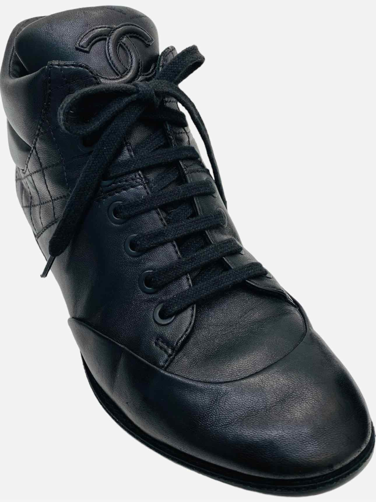 CHANEL High Top Black Quilted Sneakers