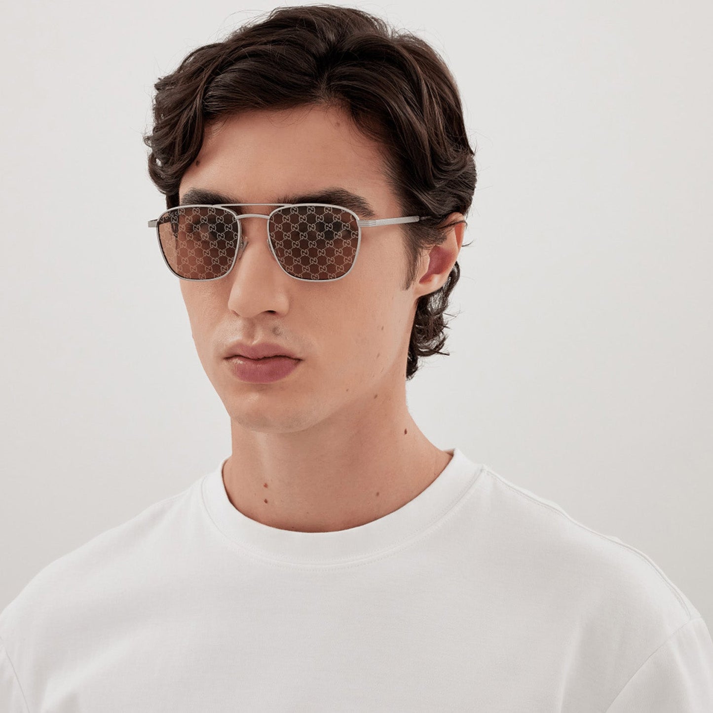INSTITUTIONAL LOGO Caravan shape. Gucci Guccissima len