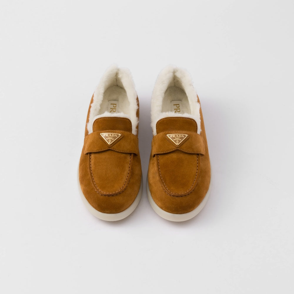 Suede and shearling loafers