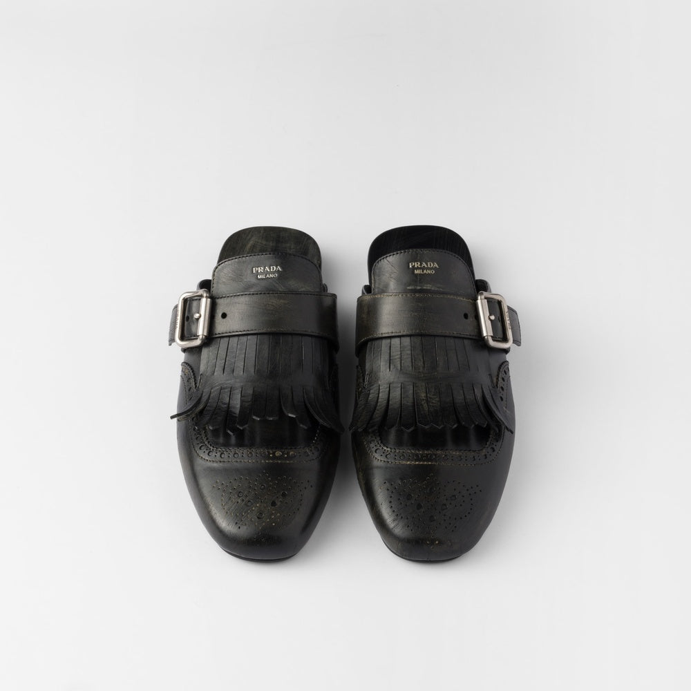 Shuffle fringed leather mules