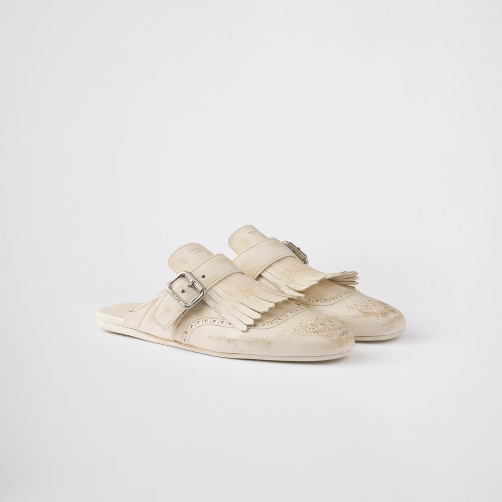 Shuffle fringed leather mules