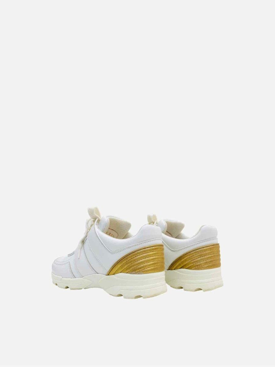 CHANEL White w/ Gold Size EU 37.5 Sneakers