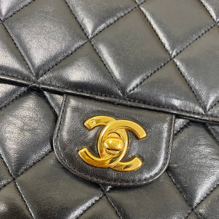 vintage Chanel single flap bag E