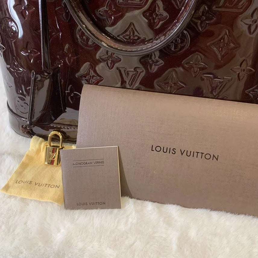 LV Alma bag