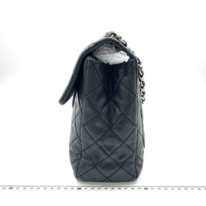 Chanel Classic Flap Maxi Black Soft Caviar Leather Silver-tone Hardware Giant CC Logo