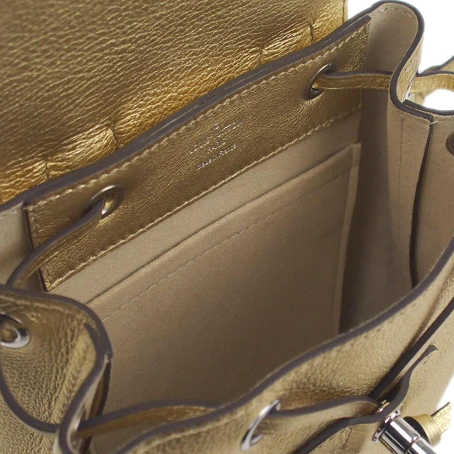 Louis-Vuitton Mini Metallic LockMe Backpack in Metallic Leather Body