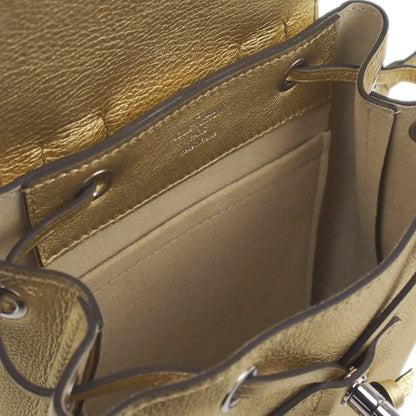 Louis-Vuitton Mini Metallic LockMe Backpack in Metallic Leather Body