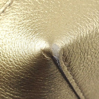 Louis-Vuitton Mini Metallic LockMe Backpack in Metallic Leather Body