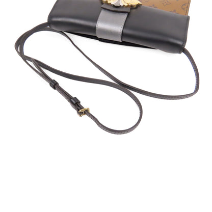 Louis-Vuitton Monogram Reverse Pochette Column Brown and Black SHW