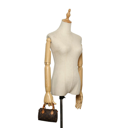 Louis-Vuitton Monogram Mini Speedy Brown