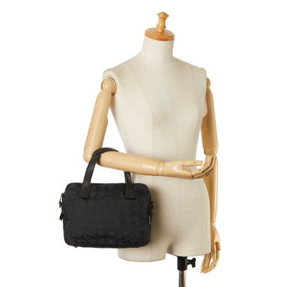 Chanel New Travel Line Handbag Canvas Handbag in Good condition
