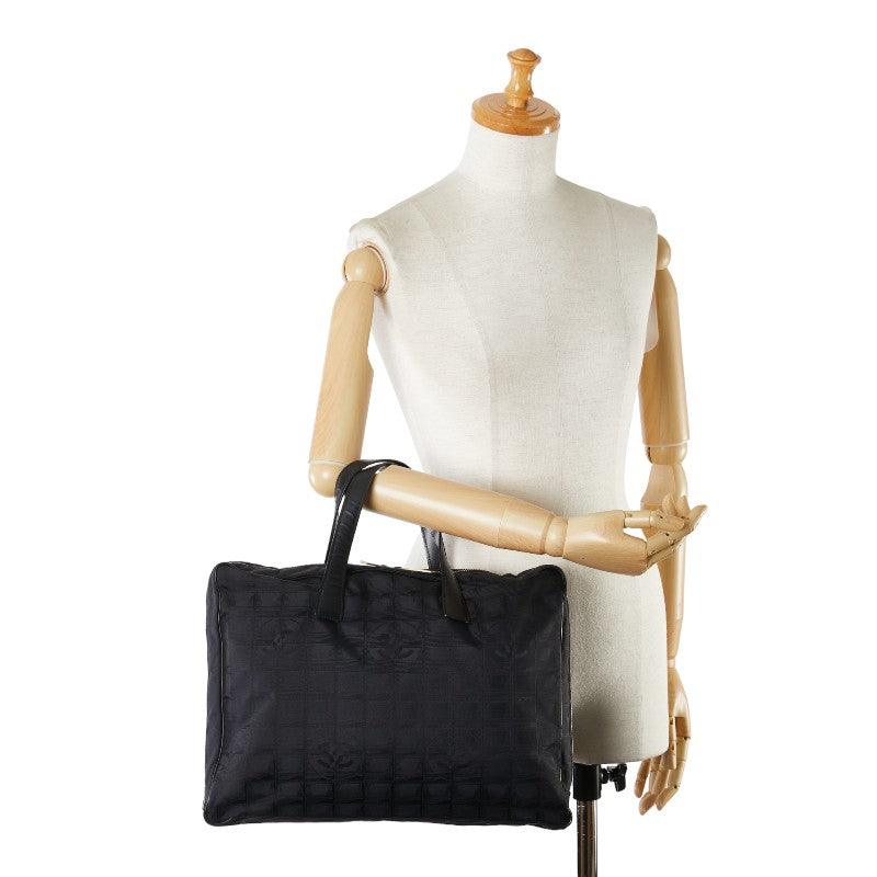 Chanel New Travel Line Tote Bag Canvas Tote Bag in Good condition