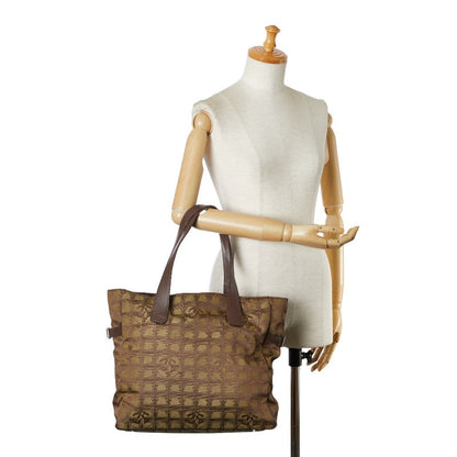 Chanel New Travel Line Tote Bag Canvas Tote Bag in Good condition
