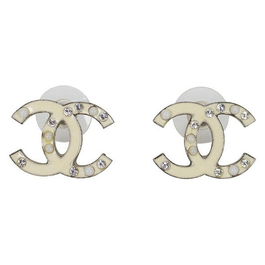 Chanel cc white metal earrings