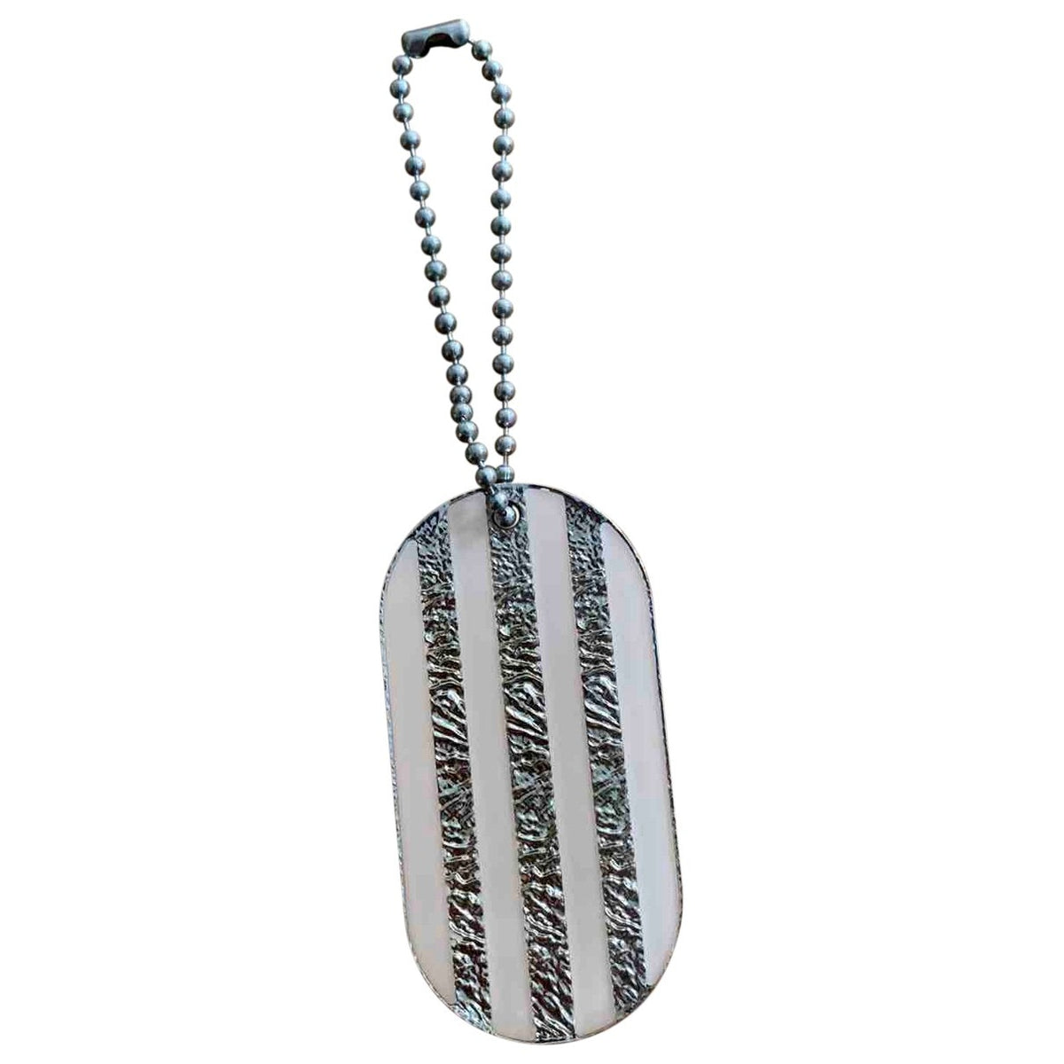 Chanel chanel silver metal bag charms