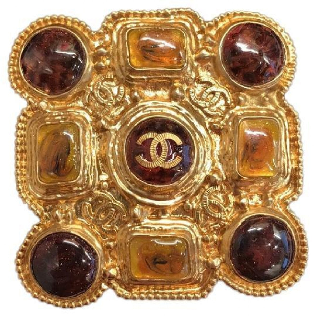 Chanel cc gold metal pins & brooches
