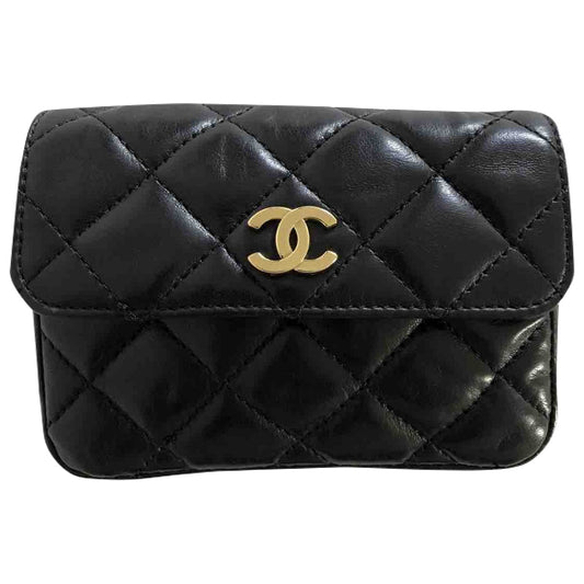 Chanel black leather clutch bag