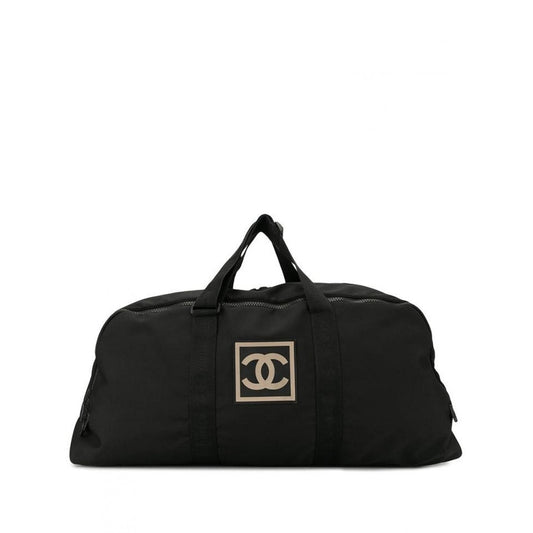 Chanel black cloth travel bag