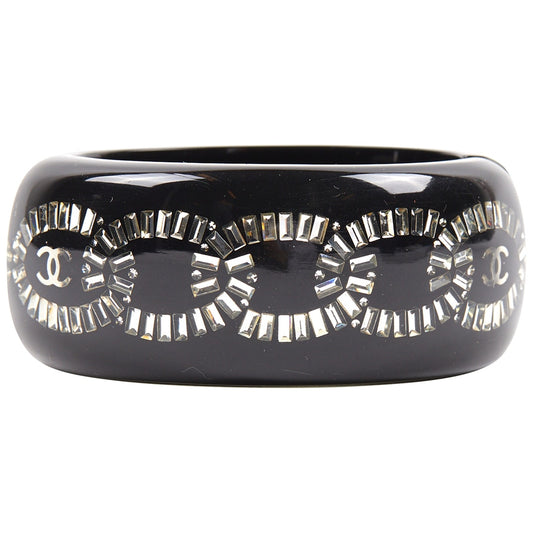 Chanel black plastic bracelets