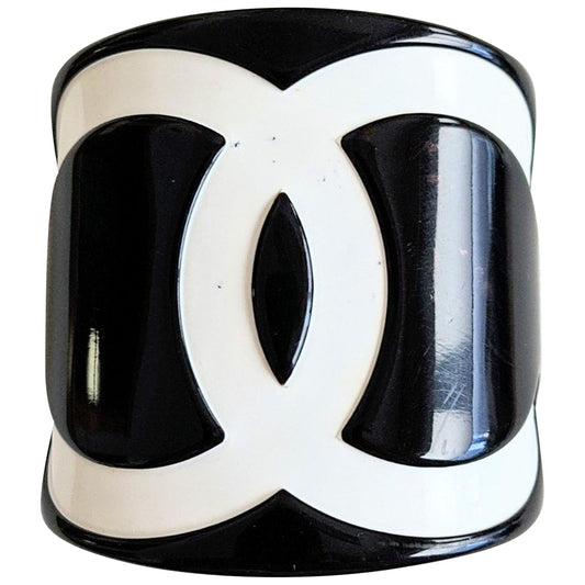 Chanel black plastic bracelets