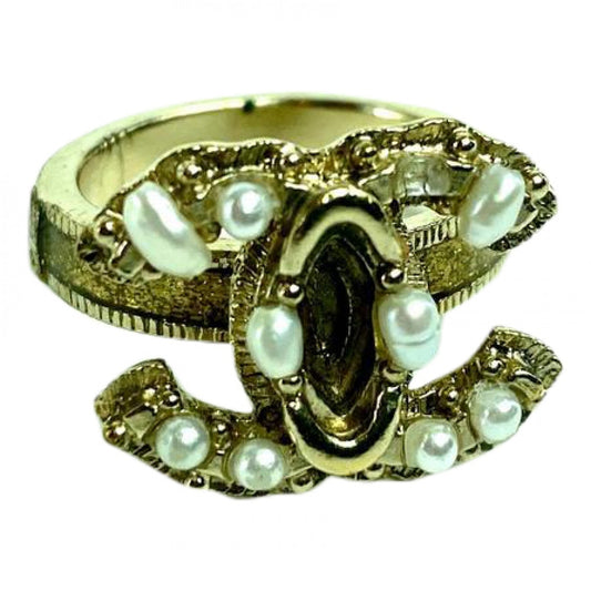 Chanel cc gold pearl rings