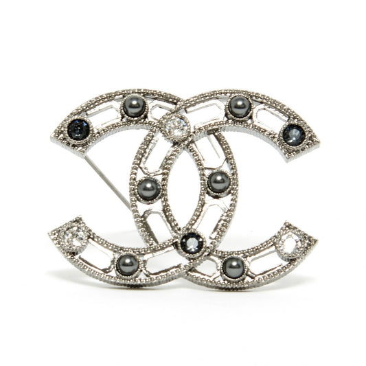 Chanel cc silver metal pins & brooches