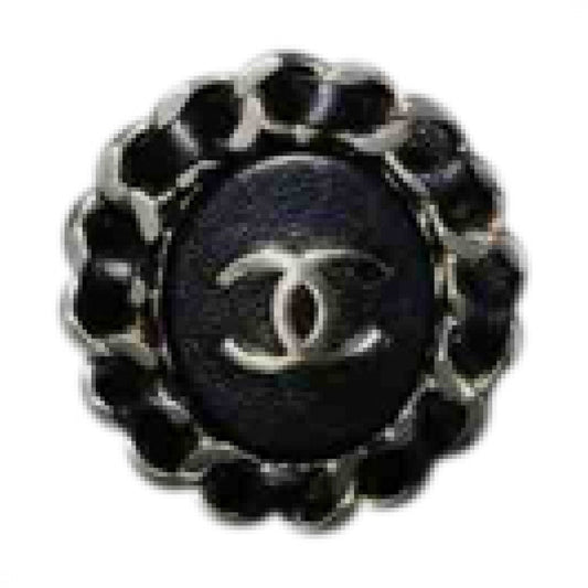 Chanel chanel black metal pins & brooches