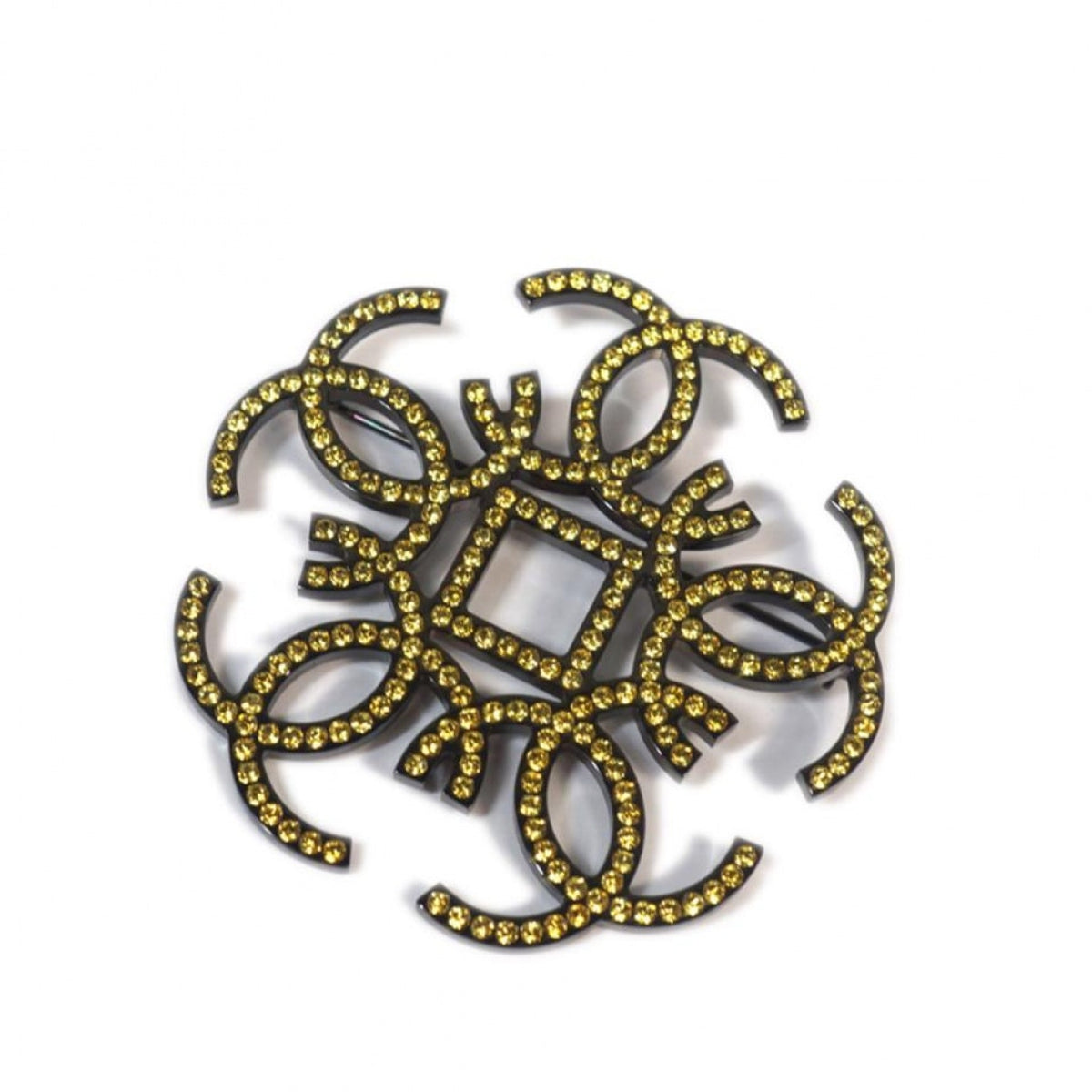 Chanel cc yellow metal pins & brooches