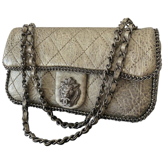 Chanel gold leather handbag