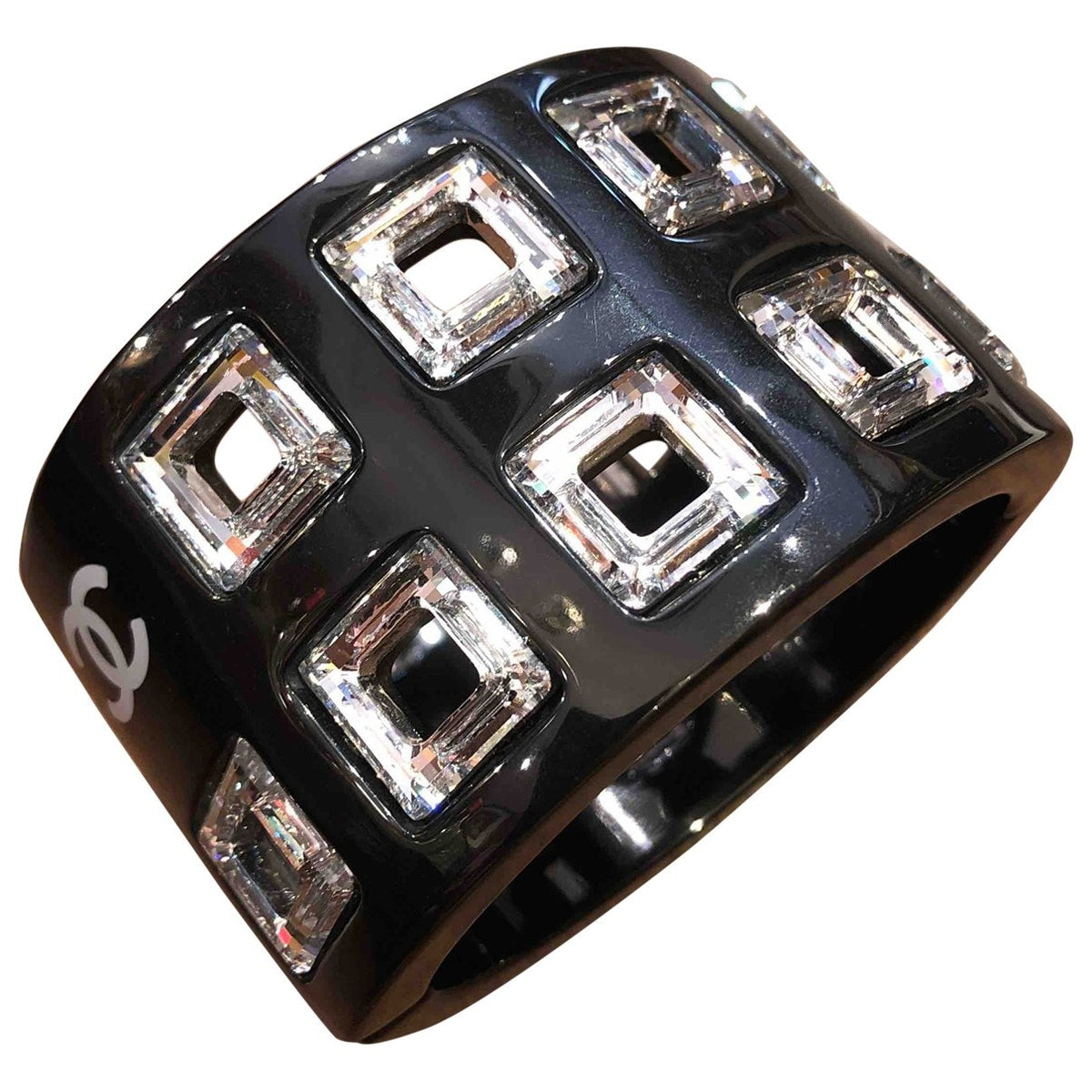 Chanel black metal bracelets