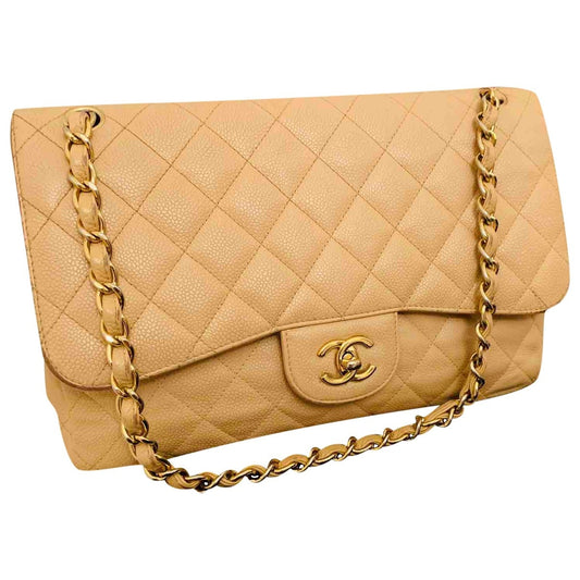 Chanel timeless/classique beige leather handbag