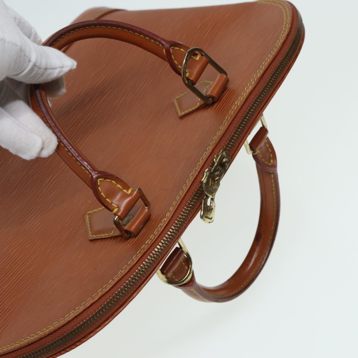 LOUIS VUITTON Alma Handbag