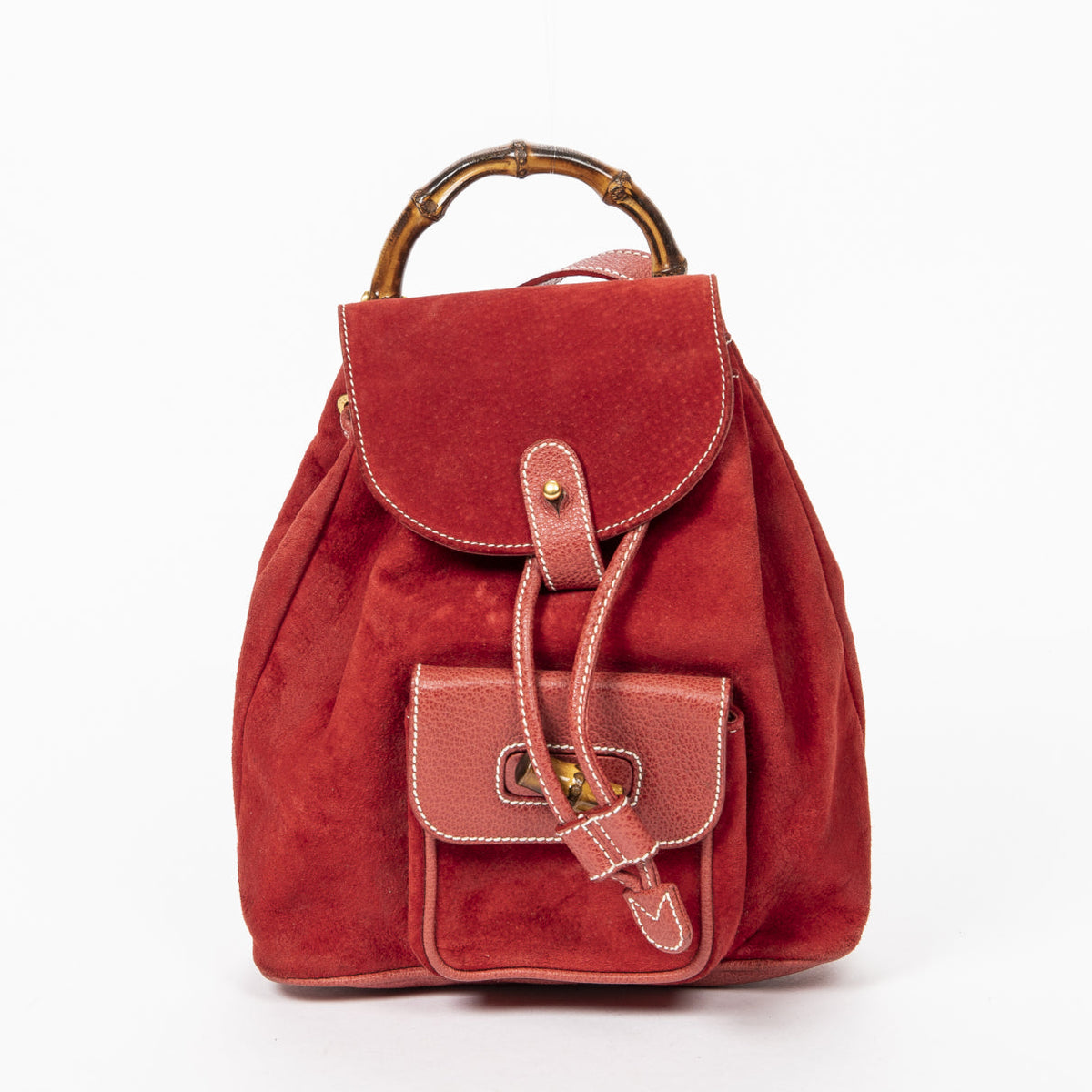Gucci red leather backpacks