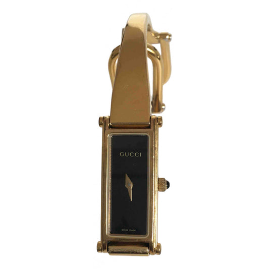 Gucci horsebit gold steel watch
