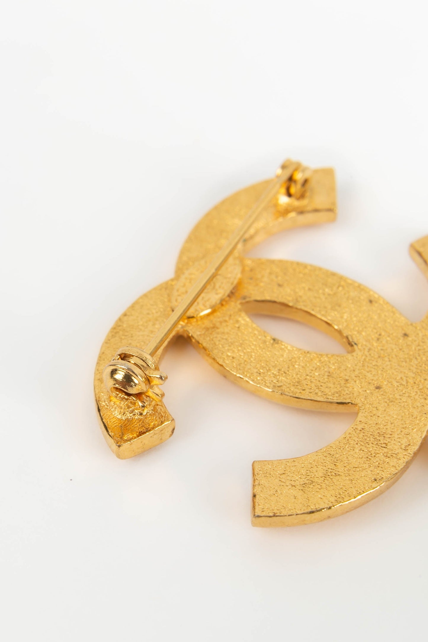 Broche charms Chanel 1995