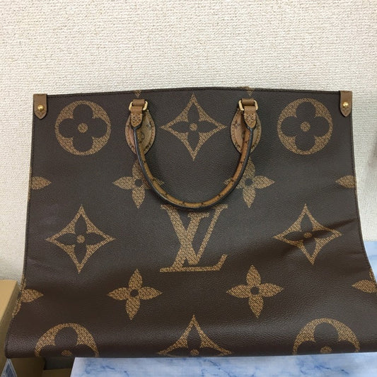 Louis Vuitton On The Go MM Coated Canvas Tote Bag,Brown