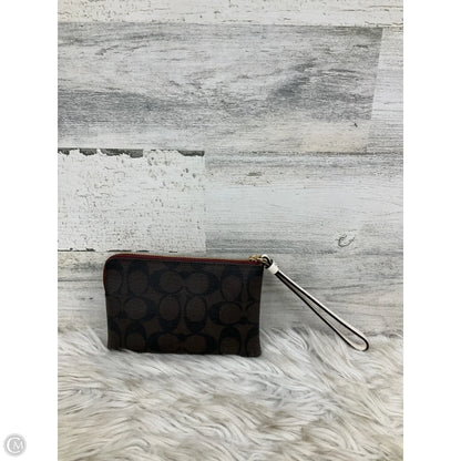 Wristlet Designer By Coach, Size: Medium